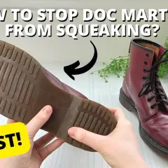 Hands hold a Dr. Martens boot sole, showing how to stop rubber soles from squeaking. A red boot is in the background.