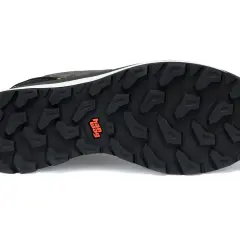The black outsoles of a hiking shoe feature a deep, aggressive tread pattern for maximum grip. The "Hag" logo is visible in orange.
