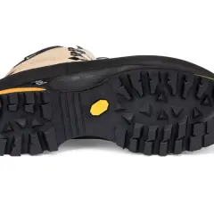 A hiking boot with a deep lug Vibram sole. While hairspray might make shoes non-slip temporarily, this boot's tread is designed for serious grip.