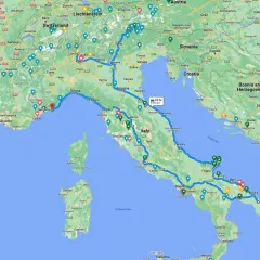 A winding blue line traces a scenic Italy road trip route from the French border, through the Alps, down the Italian peninsula, and across to Sicily.