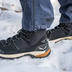 Choosing winter boots: These black Salewa boots with tan accents are perfect for snowy trails.
