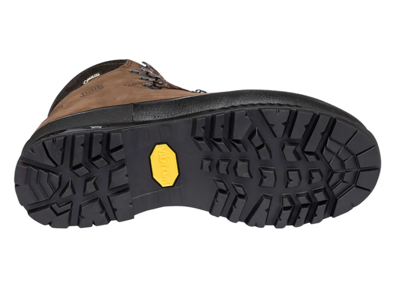 A brown hiking boot with a rugged, deep-lugged Vibram sole, showcasing various types of boot soles for optimal traction.
