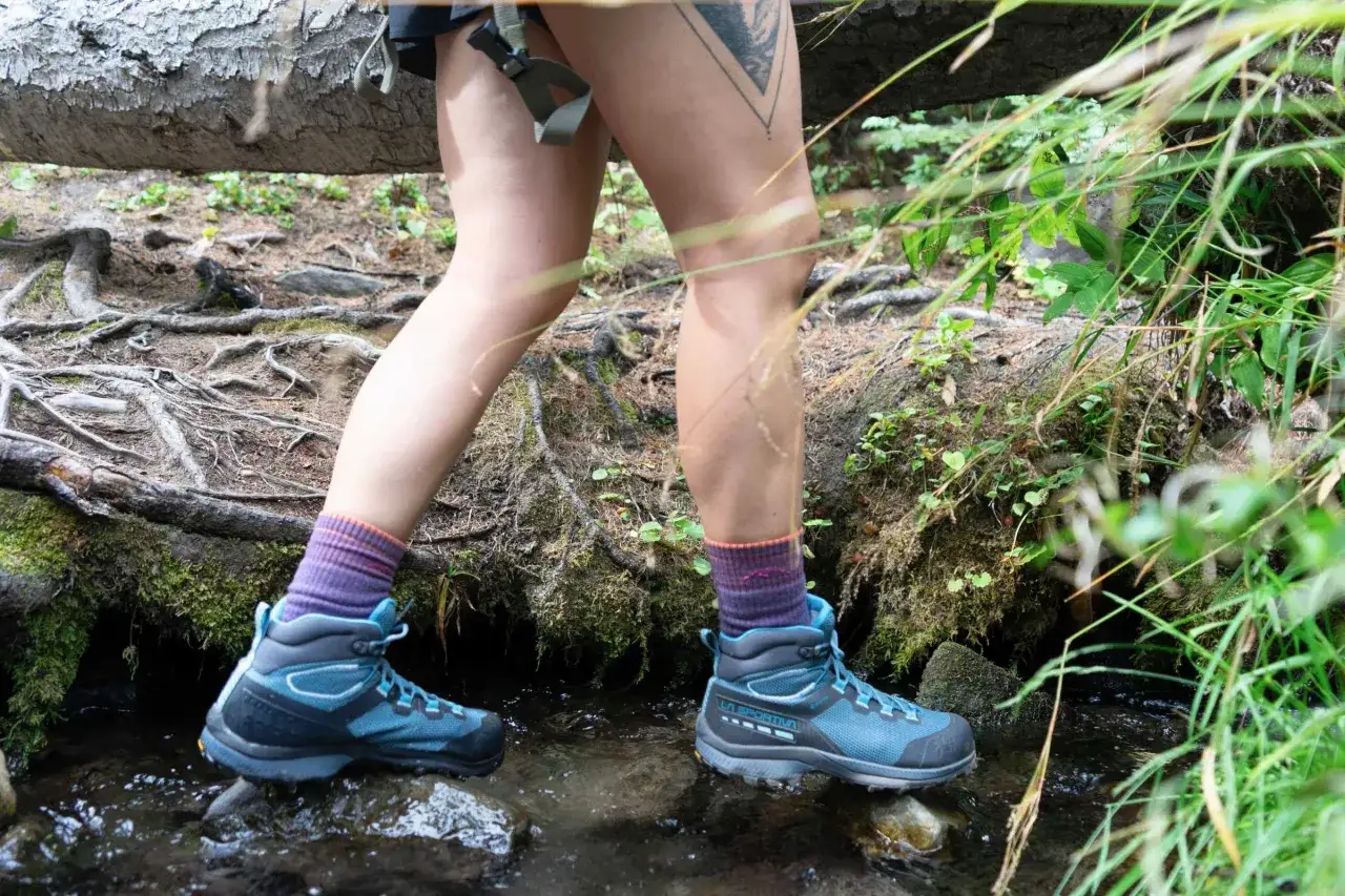 Hiking through a stream, testing the waterproof capabilities of OutDry vs Gore-Tex boots.